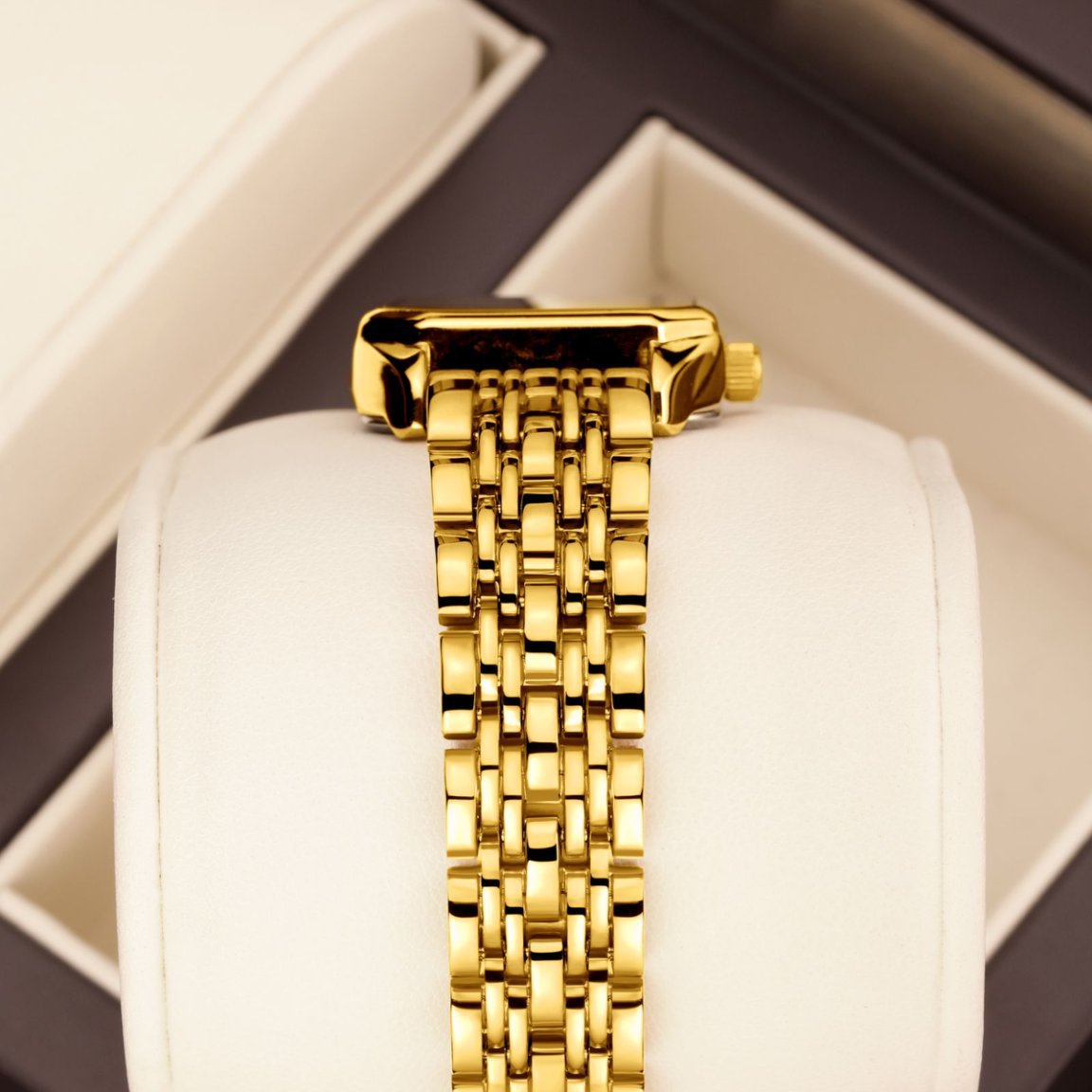 Square dial women's watch case and dial close-up detail