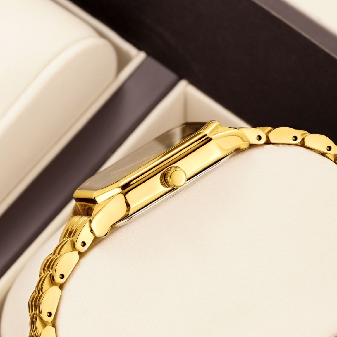 Square dial women's watch case and dial close-up detail